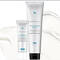 A skincare product display featuring two tubes: Glycolic 10 Renew Overnight treatment and Glycolic Renewal Cleanser Gel from SkinCeuticals, with a creamy background.