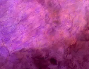 Abstract texture in shades of purple and pink, with subtle variations and depth, resembling a marbled surface.