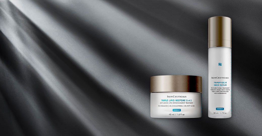 Two skincare products from SkinCeuticals are displayed against a dark, light-ray background. The first is a jar of Triple Lipid Restore 2:4:2, and the second is a bottle of Trifarotene 0.25% Emollient Treatment.