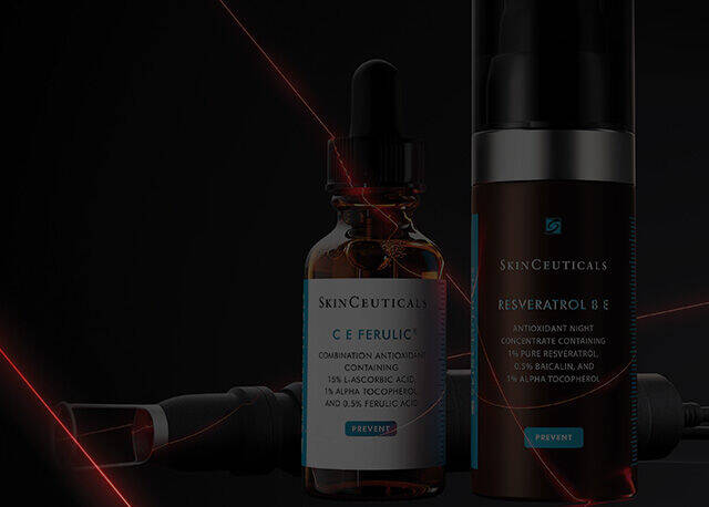 A dark background features two skincare products from SkinCeuticals: a serum in a glass dropper bottle and a cream in a pump dispenser, both showcasing their sleek design.