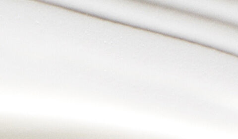Abstract image featuring smooth, wavy lines in shades of white, creating a minimalist and serene aesthetic.