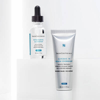 Two SkinCeuticals skincare products are displayed: a transparent bottle labeled "Retexturing Activator" and a silver tube labeled "Glycolic 10 Renew Overnight."