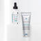 Two SkinCeuticals skincare products are displayed: a transparent bottle labeled "Retexturing Activator" and a silver tube labeled "Glycolic 10 Renew Overnight."