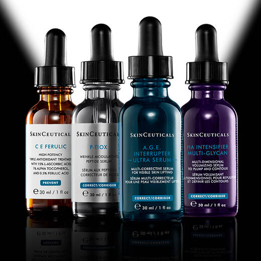 A glass dropper bottle of SkinCeuticals Hydrating B5 serum, featuring a black dropper cap and a label with product information, set against a gradient gray background.