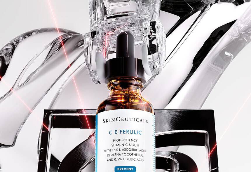 Serum bottle with dropper on a minimalist background, highlighting its sleek and modern design.