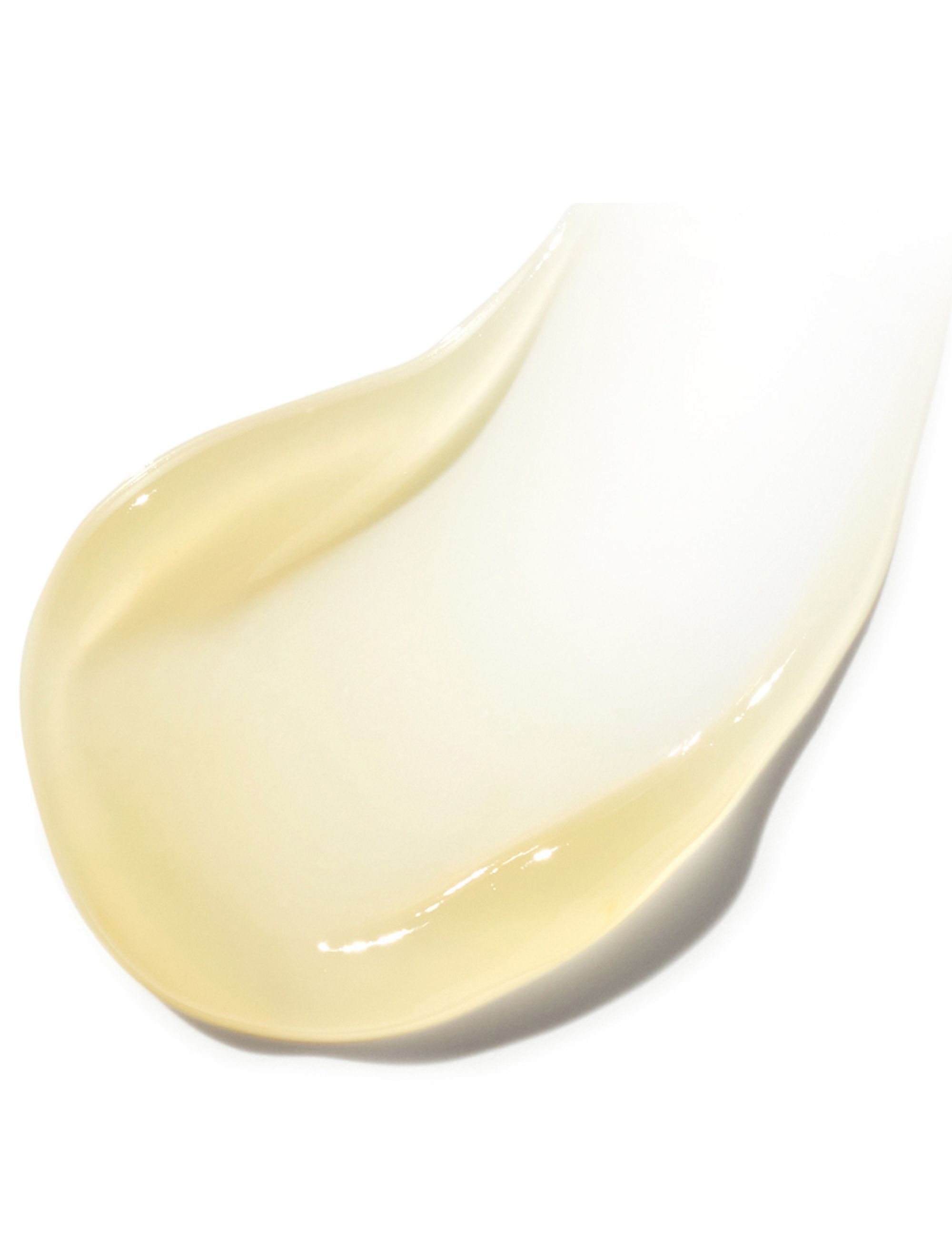 A close up swatch of a pale yellow formula, containing ferulic acid, against a white background