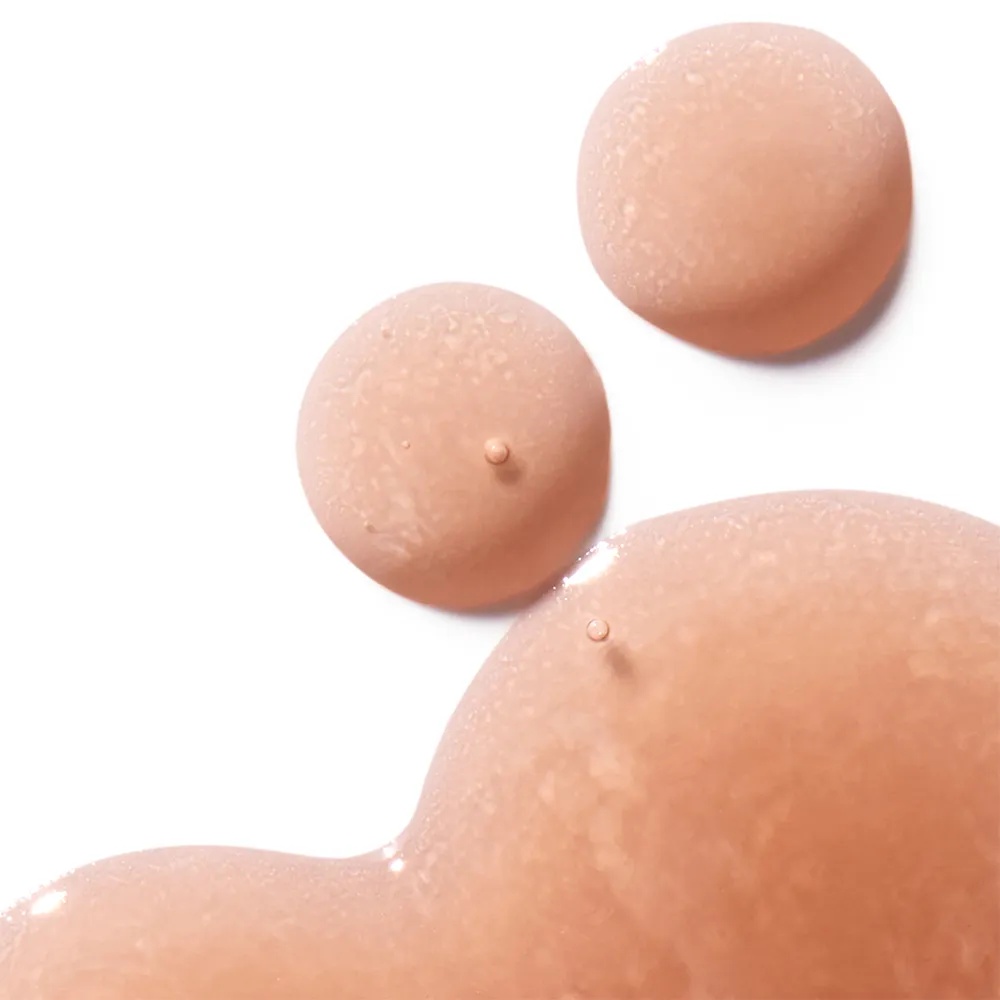 Close up of the pink glossy formulation of SkinCeuticals’ HA Intensifer Multi-Glycan
